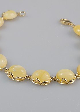 Balto gintaro apyrankė su auksu 